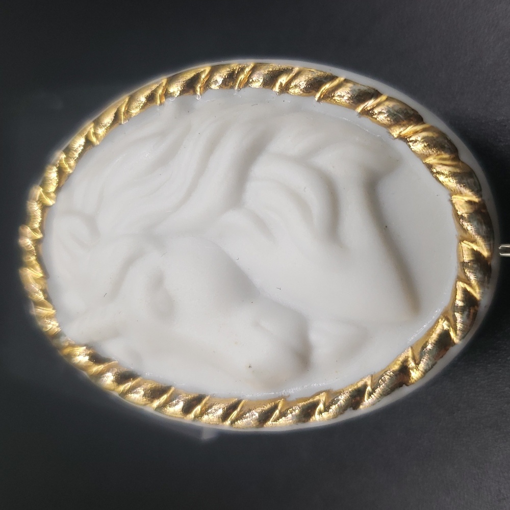 Avon 1990s White Porcelain Unicorn Head Cameo Brooch with Goldtone Edging